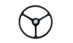 Plastic compression molded steerring wheel